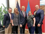  ?? [PHOTOS PROVIDED] ?? Down Syndrome Associatio­n of Central Oklahoma members Josh Harlow, from left, and Fara Taylor, pose with U.S. Sen. James Lankford, R-Oklahoma City, along with fellow members Heather Hancock-Blackburn and Mike Klehm, during a recent visit to Washington,...