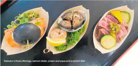  ??  ?? Daikoku’s three offerings, salmon slider, prawn and paua and a scotch fillet