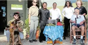  ?? Pictures: SUE MACLENNAN ?? WELCOME PARTY: Jack McLeod takes a well-earned rest at the Sibuya Game Reserve reception. With him, from left, are Justin Fox and Ollie and Jess Preston (Sibuya), Nolu Mbuyazwa (Sunshine Coast Tourism), Khanyisa Seti, Ayanda Hans and Charlene Watson.