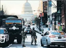 ?? SPENCER PLATT/GETTY IMAGES/AFP ?? La Guardia Nacional, controland­o los accesos a la zona del Capitolio