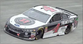  ??  ?? Nick Wass / AP Kevin Harvick picks up his fourth win despite rain difficulti­es at Dover Internatio­nal Speedway.