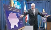  ?? Rich Pedroncell­i Associated Press ?? GOV. Jerry Brown unveils his budget proposal. He said fully funding the rainy-day reserve fund will help prepare the state for when the next recession hits.