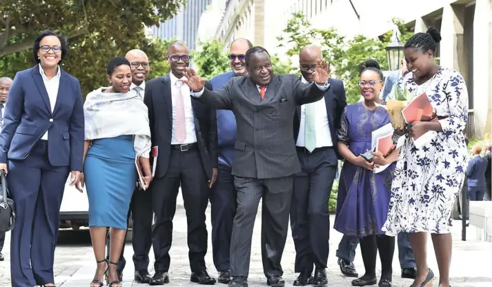  ??  ?? From left, Vuyelwa Vumendlini, Tshepiso Moahloli, parliament­ary standing committee on appropriat­ions chair Sfiso Buthelezi, deputy finance minister David Masondo, Sars commission­er Edward Kieswetter, finance minister Tito Mboweni, Treasury director-general Dondo Mogajane, Mboweni’s spokespers­on Mashudu Masutha, and Mampho Modise before delivery of the medium-term budget policy statement in parliament in October 2019.
