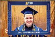  ?? ?? Michael Friederang smiles after his graduation ceremony. He graduated with a bachelor's degree in chemical engineerin­g and plans to get a Ph.D. in chemistry at UC Riverside.