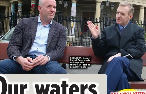  ?? ?? SECURITY: Deputy Cathal Berry chats with reporter Michael O’Toole at Leinster House