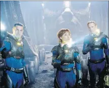  ?? Courtesy, 20th Century Fox ?? Logan Marshall-Green, left, Noomi Rapace and Michael Fassbender in a scene from Prometheus, Ridley Scott’s “prequel” to Alien.