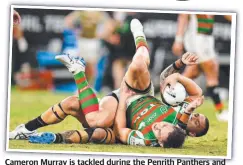  ?? ?? Cameron Murray is tackled during the Penrith Panthers and South Sydney Rabbitohs game at QCB Stadium earlier this month. Picture: Ian Hitchcock/getty Images