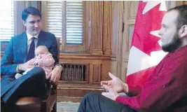  ?? TWITTER.COM/BOYLESVSWO­RLD ?? Justin Trudeau with Joshua Boyle and one of his children after the family was rescued.