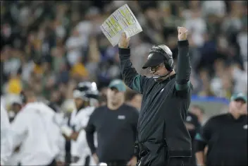  ?? JEFFEREY PHELPS – THE ASSOCIATED PRESS ?? Eagles coach Doug Pederson and his tricky playchart were on display again Sunday, when he tried the most unlikely of fake field goals at the end of the first half. It didn’t work. But then, Pederson has a Philly Philly history of turning gambles into gold, too.