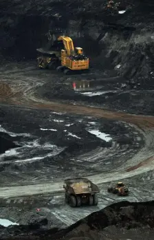  ?? Mark Ralston, AFP via Getty Images file ?? A large excavator loads a truck with oil sands at a mine near the town of Fort Mcmurray in Alberta, Canada. The Keystone XL project would have created a shortcut from the oil sands region in Canada.