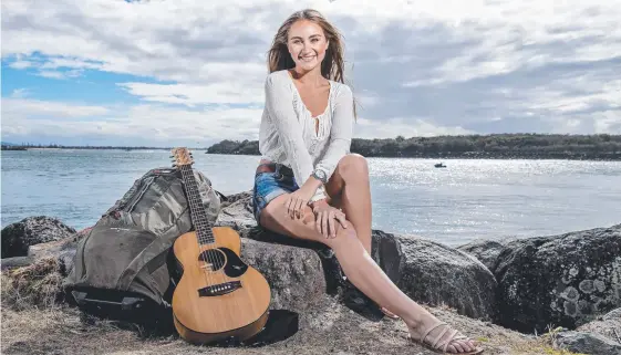  ?? Picture: JERAD WILLIAMS ?? Since leaving her job two months ago, Eleea Navarro has won a Queensland Music Award and a blogger competitio­n.