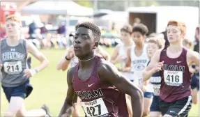  ?? Bud Sullins/Special to the Herald-Leader ?? Noah Granderson was the top finisher of all divisions Saturday in the junior high boys division of the Panther Cross Country Classic.