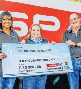  ??  ?? FOR A GOOD CAUSE: SPAR EC sponsorshi­p controller Roseann Shadrach, left, hands over a R10 000 cheque to SOS Children’s Village fundraiser Mandy Spies. The monies were raised through the Little Ladies Race earlier this year