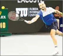  ?? ?? Grigor Dimitrov, of Bulgaria, can’t reach a shot from Alexander Zverev, of Germany, during the Miami Open tennis tournament in Miami Gardens, Fla. (AP)