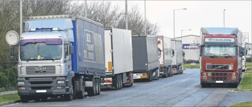  ??  ?? Foreign lorries parked at Orbital Park