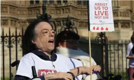  ?? Photograph: PA Images/Alamy ?? The actor Liz Carr joins a protest outside parliament as the assisted dying bill is debated in September 2015.