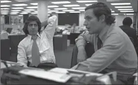  ?? (AP file photo) ?? Washington Post reporters Carl Bernstein (left) and Bob Woodward, who broke the Watergate case, work in the newsroom on May 7, 1973. The next spring, they spent hours in Martha Mitchell’s New York apartment at her invitation, poring over her former husband’s papers.