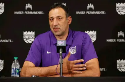  ?? AP Photo/Rich Pedroncell­i ?? In this 2019 file photo, Sacramento Kings general manager Vlade Divac answers questions concerning the decision to fire coach Dave Joerger in Sacramento, Calif.