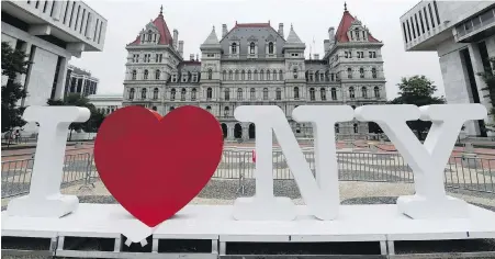  ??  ?? An “I Love New York” sign sits in the Empire State Plaza for installati­on in front of the New York state Capitol in Albany in June last year.