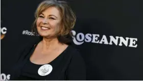  ?? PHOTO BY JORDAN STRAUSS/INVISION/AP ?? In this March 23 file photo, Roseanne Barr arrives at the Los Angeles premiere of “Roseanne” in Burbank. Barr on Tuesday tweeted that she was sorry to Jarrett “for making a bad joke about her politics and her looks.” Jarrett, who is African-American,...