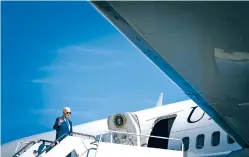  ?? KENT NISHIMURA/NEW YORK TIMES FILE PHOTO ?? President Joe Biden boards Air Force One for a trip to New York earlier this month at Joint Base Andrews in Maryland. Last week, Biden was forced to defend his mental acuity publicly after a special counsel’s report said there was evidence that he may have willfully retained classified documents.