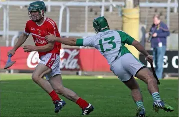  ??  ?? Niall O’Reilly of Monageer-Boolavogue avoids the challenge of Niall Murphy (Crossabeg-Ballymurn).