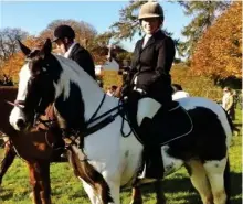  ??  ?? Country life: Hunt groom Lisa Ford in the saddle