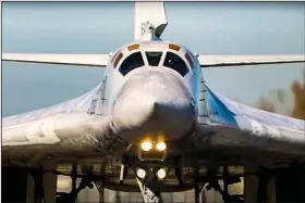  ?? (AP/Russian Defense Ministry Press Service) ?? A long-range Russian Tu-160 bomber takes off from an airfield in Russia last month to patrol in the airspace of Belarus.