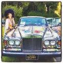  ??  ?? Donna Ewald Huggins and her Summer of Love Rolls-Royce at the Conservato­ry of Flowers.