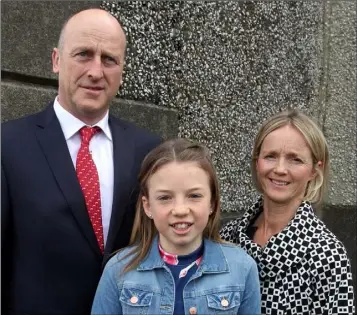  ??  ?? Jane Sinnott on the occasion of her Confirmati­on in Murrintown on Thursday morning, with her parents Tom and Avril.