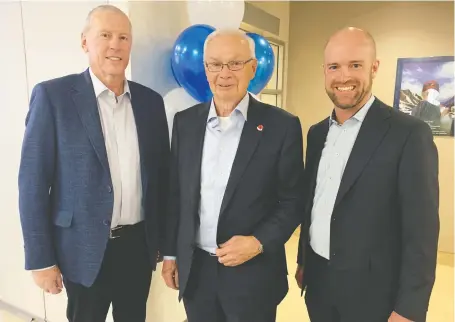  ?? PROSTATE CANCER CENTRE ?? Pictured at a recent plaque unveiling at Calgary’s Prostate Cancer Centre honouring Remington Developmen­t Corporatio­n for its invaluable support of the centre through the annual Remington Charity Golf Tournament are, from left, Remington founder Randy Remington, PCC past board chair Mike Wilson and Remington president and PCC board member Cody Clayton.