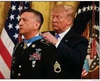  ?? AP/CAROLYN KASTER ?? Army Staff Sgt. David Bellavia receives the Medal of Honor on Tuesday from President Donald Trump at the White House.