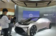  ?? ZHANG DANDAN / CHINA DAILY ?? Chinese electric vehicle startup Nio Inc exhibits its first concept model, Nio eve, at the 2019 Haikou Internatio­nal New Energy Vehicle Show.