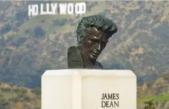  ?? Richard Vogel / Associated Press ?? This bust of actor James Dean is on display at the Griffith Observator­y in Los Angeles.