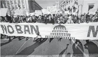  ?? Manuel Balce Ceneta / Associated Press ?? Demonstrat­ors protesting the immigratio­n policies of President Donald Trump march Saturday from Lafayette Park near the White House in Washington.