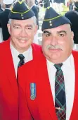  ??  ?? Retired RCMP officers Bob Underwood and Laurier Cadieux officiated for the 27th time at Royal Vancouver Yacht Club’s opening day.