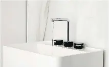  ??  ?? Linear forms tend to be more popular than curvy ones when it comes to fixtures these days, as this Marmo bathroom faucet from Aquabrass shows.