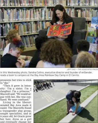  ?? JEFF CHIU — THE ASSOCIATED PRESS ?? In this Wednesday photo, Sandra Collins, executive director and founder of enGender, reads a book to campers at the Bay Area Rainbow Day Camp in El Cerrito.