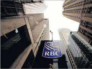  ?? CP PHOTO ?? A Royal Bank of Canada sign is shown in the financial district in Toronto last year.