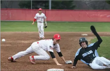  ?? PILOT PHOTO/KATHY HALL ?? Plymouth third baseman Matt Manzuk and St. Joe’s Thomas Eck watch a ball get away at third. Before the game was over, Manzuk would take the win on the mound and Eck would get the loss.