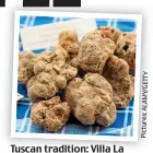  ??  ?? Tuscan tradition: Villa La Massa, left. Above, white truffles and, below, the Lagotto Romagnolo dogs trained to hunt them Pictures:ALAMY/GETTY