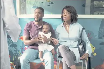  ?? NETFLIX ?? Kevin Hart, left, and Alfre Woodard star in the formulaic but entertaini­ng drama “Fatherhood”