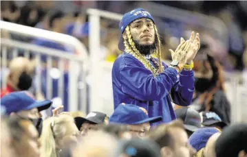  ?? DANIEL A. VARELA dvarela@miamiheral­d.com ?? New York-born rapper Tekashi 6ix9ine reacts to the New York Mets losing to the Miami Marlins 5-4 at loanDepot park on Aug. 3, 2021.