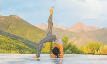  ?? Photo provided by Snowmass tourism ?? Take an open-air yoga class in Snowmass.