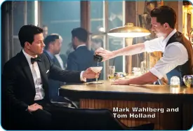  ?? ?? Mark Wahlberg and Tom Holland