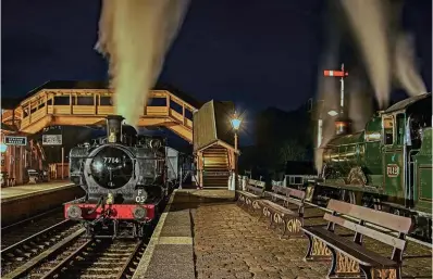  ?? ?? Essential Great Western by moonlight: A pannier tank passes a passenger train at Bewdley in platform 3.