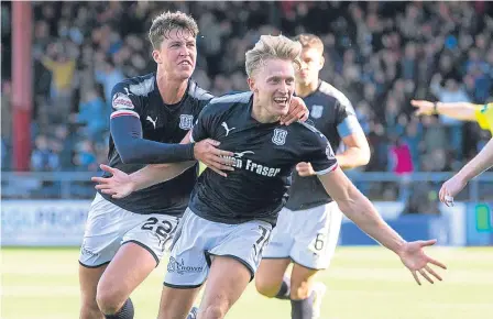  ??  ?? New boy A-Jay Leitch-Smith celebrates after grabbing two goals in Saturday’s 3-2 win over St Johnstone.