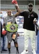  ?? Picture: MARK ANDREWS ?? BACK: Lusanda Komanisi, left, will return to the ring when his promoter Happy Tewo, right, stages his bout against Sinethemba Bam.