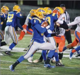  ??  ?? Cazenovia wideout James Pavelchak knifes his way through the Oneida defense during a Section III Class B semifinal bout.