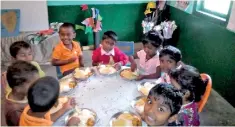  ??  ?? Early Childhood and Pre-school children enjoying their special meals